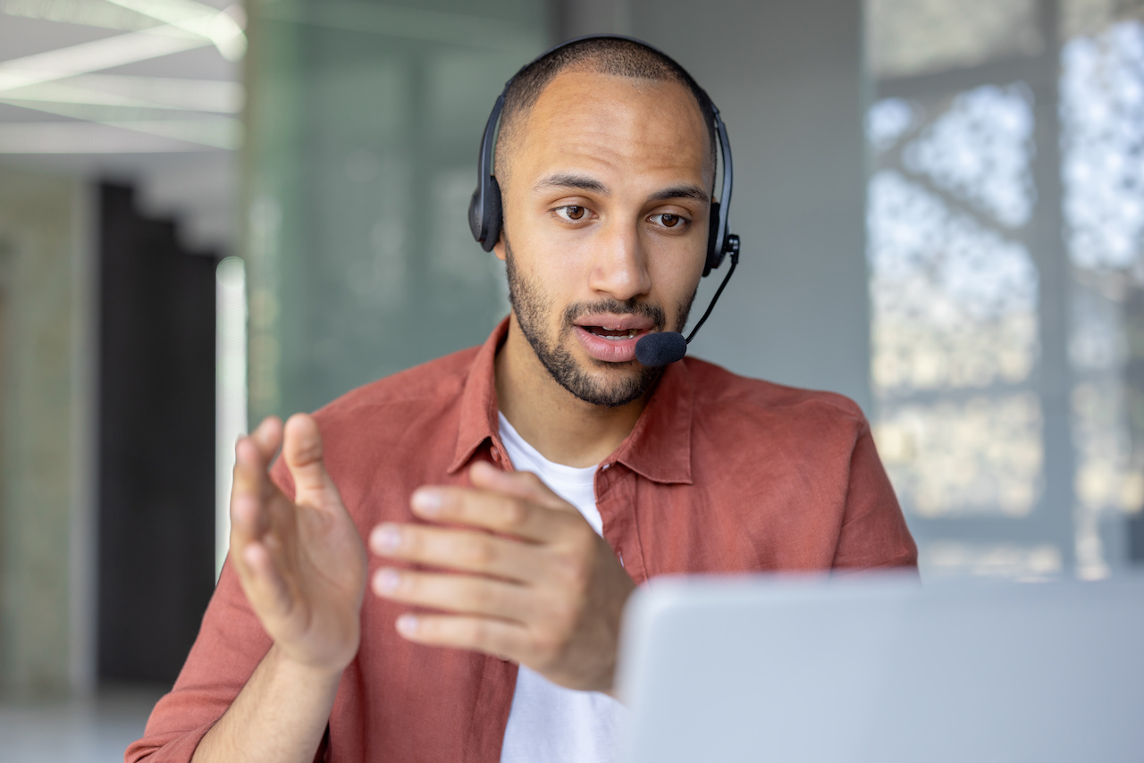Man with headset making a service call