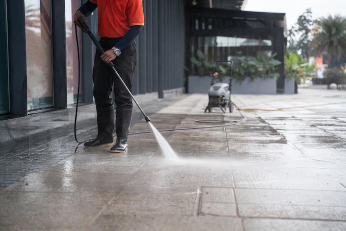 Power washing a modern patio